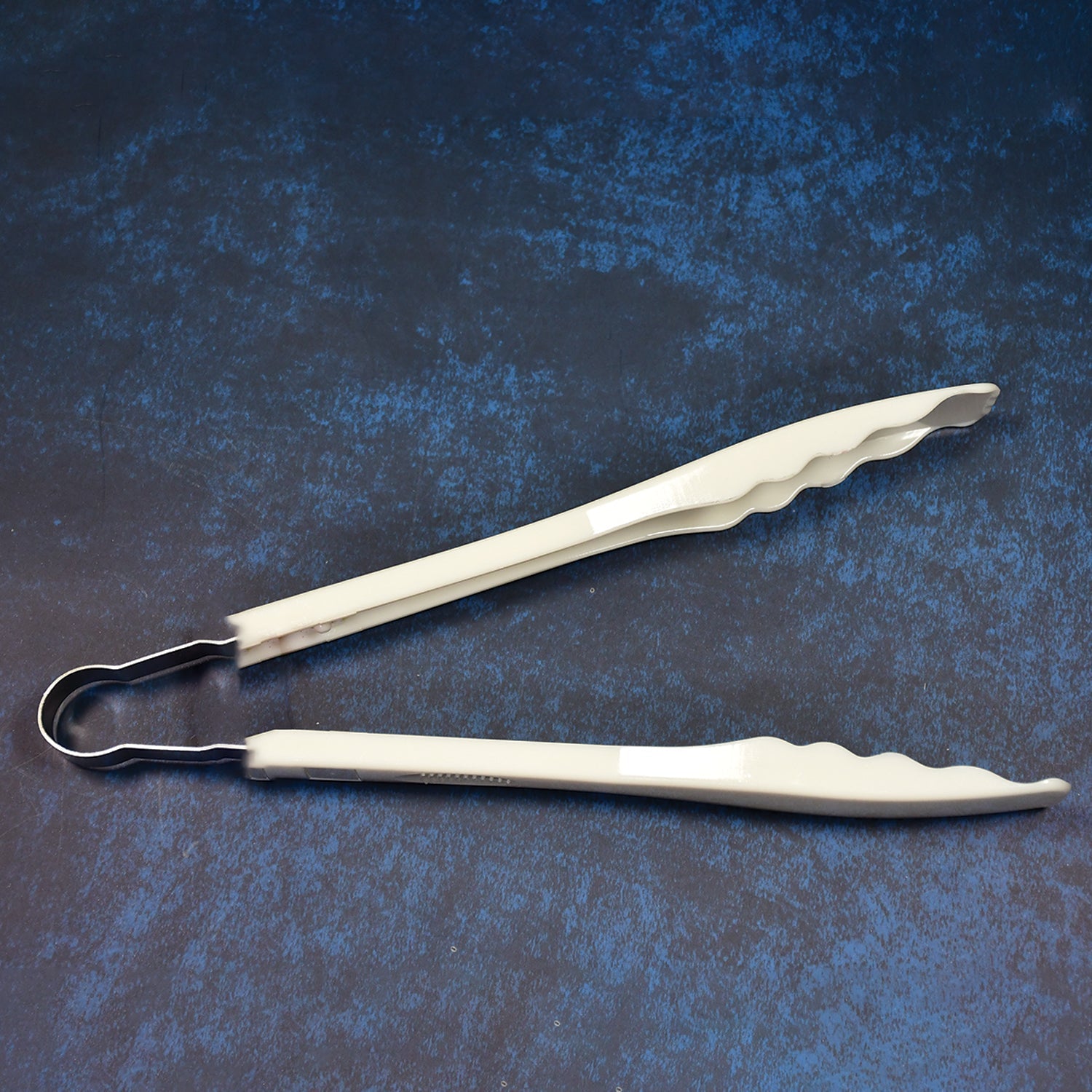 Kitchen tongs with easy grip handles. Kitchen tongs with easy grip handles.